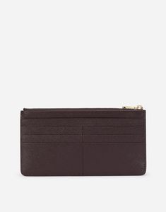 This large card holder in Dauphine calfskin comes with a practical accordion compartment with top zipper so it can also be used as a coin wallet. Spacious and versatile, it comes with the branded plate featuring two metal plating finishes. Six card slots and two flat pockets Flat front pocket Zipped coin pocket on top with branded slider Measurements. 9.7 x 18.5 x 1.5 cm - 3.8 x 7.3 x 0.6 inches Made in Italy Classic Business Wallet, Classic Business Wallets With Zipper Pocket, Classic Business Wallet With Zipper Pocket, Elegant Bifold Wallet With Zipper Pocket, Elegant Formal Card Holder With Zipper Closure, Classic Business Card Holder With Zipper Closure, Formal Card Holder With Zipper Closure, Coin Wallet, Purple Leather