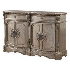 an antique style sideboard with two doors