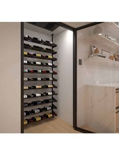 a wine rack in the corner of a kitchen