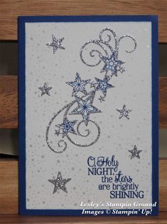 a card with stars on it and the words glory in blue, white and silver