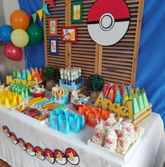 a pokemon themed birthday party with cake and candy