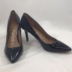 Classic Black Patent Pump With 3.25” Heel. Gold Logo At Back. These Are In Perfect Unworn Condition. This Look Is Always Currenta Closet Staple. Does Not Come With Original Box. Size 9m Classic Calvin Klein Pointed Toe Heels, Classic Calvin Klein Round Toe Heels, Calvin Klein Heels For Work, Calvin Klein Fitted Heels For Workwear, Sleek Calvin Klein Heels For Party, Calvin Klein Office Heels, Classic Calvin Klein Evening Heels, Calvin Klein Pointed Toe Heels, Calvin Klein Black Heels For Spring