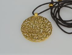 "Handmade Islamic necklace, Arabic Quran SURAT AL-FALAQ verse necklace, handmade calligraphy necklace. Gift for her A very beautiful piece of art necklace with Quran Arabic verse totally handmade without any interfere of any machinery The verse is Surat Al-Falaq (The Daybreak) and its words are as follows Say, \"I seek refuge in the Lord of daybreak -------- قُلْ أَعُوذُ بِرَبِّ الْفَلَقِ From the evil of that which He created ---------- مِن شَرِّ مَا خَلَقَ And from the evil of darkness when it Spiritual Pendant Necklace For Personalized Gift, Handmade Round Necklaces For Blessing, Handmade Round Necklace For Blessing, Gold Necklace With Artistic Round Pendant, Gold Necklace With Artistic Design And Round Pendant, Gold Necklace With Round Pendant And Artistic Design, Spiritual Pendant Necklace With Artistic Design, Adjustable Spiritual Necklace With Artistic Design, Traditional Handmade Jewelry For Personalized Gift