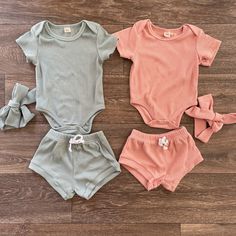 This ribbed baby set is perfect for summer. The top has button snaps to make easy changes. The shorts are cute and comfy with a drawstring. Casual Solid Color Playtime Set, Cute Solid Color Summer Sets, Cute Matching Set Bottoms For Summer, Solid Ribbed Summer Sets, Cute Cotton Shorts In Solid Color, Casual Summer Playtime Short Set, Casual Summer Short Set For Playtime, Solid Ribbed Shorts For Summer, Casual Ribbed Summer Sets