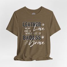 Elevate your style with our 'Leather, Lace, and a Whole Lot of Badass Grace' Women's Motorcycle T-shirt. This tee features a captivating design with a butterfly, roses, and motorcycle wings in the background. Product details This classic unisex jersey short sleeve tee fits like a well-loved favorite. Soft cotton and quality print make users fall in love with it over and over again. These t-shirts have-ribbed knit collars to bolster shaping. The shoulders are tapered for a better fit over time. Dual side seams hold the garment's shape for longer. >Bella Canvas 3001 TShirt >This t-shirt comes with a lightweight fabric (4.2 oz/yd² (142 g/m²)) >The tear-away label minimizes skin irritations and provides a scratch-free wearing experience. >Fabric blends: Ash - 99% Airlume combed and ring-spun c Biker Style T-shirt With Letter Print And Crew Neck, Biker T-shirt With Letter Print And Crew Neck, Biker Style Crew Neck T-shirt With Custom Print, Moto Style Graphic Print Crew Neck T-shirt, Biker Style Text Print Crew Neck T-shirt, Light Font, Motorcycle Tshirts, Crew Neck Tshirt, Motorcycle Women