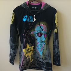 a women's hoodie with an image of a woman wearing sunglasses on it