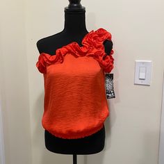 One Shoulder Blouse Bran New With Ruffled Detail And Elastic Waist Flirty Sleeveless Tops With Ruffles, Flirty Sleeveless Ruffled Top, Flirty Red Top With Ruffles, Flirty Short Sleeve Top With Ruffles, Flirty Ruffle Tops For Party, Flirty Short Sleeve Blouse With Ruffles, Flirty Ruffled Blouse For Night Out, Heart Top, Color Orange