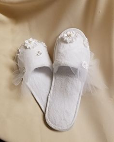 "Cute Honeymoon Bedroom slippers for the bride! Makes great Bridal shower gift It features a beautiful veil with flowers, and \"wedding rings,\" pearls hang over her toes, they look very cute Honeymoon Bedroom slippers, light weight, not safe for outdoors use. SLIPPERS WILL HAVE ONLY ONE SET OF RINGS (meaning one couple getting married) ON THE LEFT FOOT, THE SIDE WHERE THE HEART IS! US Sizes: Small = 5-6 (Available 6) Medium = 6.5 - 7.5 (Available 6) Large = 8 - 9 ( 10 available) XL = 10 (Availa White Tulle Bridal Accessories For Bridal Shower, White Tulle Bridal Accessories For Wedding Night, Rings Meaning, Veil With Flowers, Honeymoon Bedroom, Rings With Meaning, Bridal Slippers, Slippers White, Set Of Rings