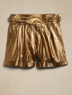 Heritage made contemporary, these bold shorts evoke the spirit of exploration with soft, luxurious leather in a vintage-inspired silhouette.  We kept the utilitarian details of the past and added a metallic finish to carry over into modern style with Gold Pants, Metallic Shorts, Dress Label, Gold Shorts, Track Shorts, Matches Fashion, Fancy Outfits, Brown Fashion, Metallic Leather