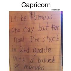 a piece of paper that says capricon i'll be ht mous one day but for now i'm stuck in 2nd grade with a bunch of morons