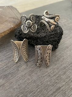 You can choose between 4 different and unique sterling silver rings. Each has a different style and design, but all are perfect for your day by day outfits and super comfy and easy to match with other accessories and any outfit. In one of the pictures you can see a number that represents each ring for you to choose from. Ring #1- Size 8.75, can be open to a bigger size but this will create a gap in the front. And the ring is 2.7cm- 1.10 inch long Ring #2- Size 8.5 , can be open to a bigger size Silver Open Ring Jewelry With Unique Variations, Handmade Vintage Wide Band Open Ring, Vintage Handmade Wide Band Open Ring, Artistic Silver Open Ring, Unique Handmade Stackable Rings With Open Band, Unique Handmade Open Band Stackable Rings, Unique Handmade Wide Band Open Ring, Vintage Open Ring With Unique Design, Handmade Open Band Custom Rings