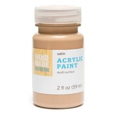 a bottle of acrylic paint on a white background