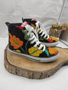 Handmade vintage high top sneakers. Every size available. #hightopsneakers #sneakers #tennisshoes #womenshoes #sportshoes #vintage #womenfashion #forher Casual Embroidered Closed Toe Sneakers, Casual Sneakers With Multicolor Embroidery And Appliques, Spring Sneakers With Multicolor Embroidery And Appliques, Casual Sneakers With Multicolor Embroidery And Round Toe, Embroidered Black Lace-up Sneakers, Black Embroidered Lace-up Sneakers, High-top Multicolor Embroidered Sneakers, High-top Embroidered Multicolor Sneakers, Black Embroidered Low-top Sneakers