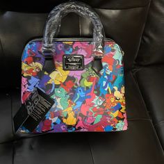 Brand New, Multi-Colored Disney Loungefly Bag; For The Cat Lovers; Small And Compact But Spacious With 2 Separate Sections For Your Favorite Items To Include; Classic But Also For The Dress Down Days; Good For Casual Nights On The Town Or Dancing The Night Away Moments; Don’t Miss This Item; Get It Before It’s Gone. Multicolor Character Print Travel Bag, Multicolor Character Print Bags For Daily Use, Disney Character Print Multicolor Bags, Disney Multicolor Rectangular Bag, Disney Multicolor Bags With Adjustable Strap, Carpet Bag Purse, Mickey Mouse Purse, Minnie Mouse Purse, Minnie Mouse Bag