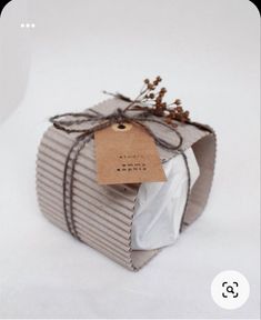 a wrapped gift with a tag attached to it