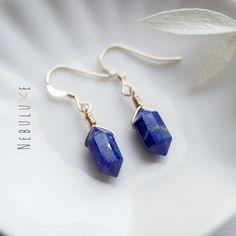 💙 Adorn yourself with the celestial allure of genuine lapis lazuli points in our exquisite earrings. Crafted in three stunning finishes & designs, this lapis lazuli jewelry exudes elegance and mystique. Elevate your style with the deep, celestial blue of lapis lazuli, capturing the beauty of the cosmos in every wear 💙 ⭒ Material: Hooks: 925 Sterling Silver / 14k Gold & Rose Gold Filled, Hoops: Stainless Steel, Threaders: 925 Sterling Silver ⭒ Finish: Silver * Gold * Rose Gold ⭒ Hooks length: Celestial Style Earrings With Ear Wire For Everyday, Celestial Style Everyday Earrings With Ear Wire, Everyday Celestial Style Earrings With Ear Wire, Celestial Drop Earrings Gift, Celestial Style Drop Earrings As Gift, Celestial Nickel-free Earrings As Gift, Nickel-free Celestial Earrings Gift, Celestial Nickel-free Earrings For Gifts, Celestial Drop Earrings For Everyday