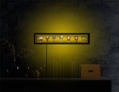 a yellow light shines on the side of a dark room with four pop - up dolls