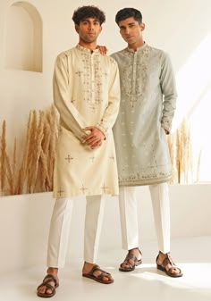 This ensemble showcases an Ivory Chinese Collar Kurta Set adorned with a refined Chinese collar and metallic silver buttons. Hand-embroidered details throughout the kurta add an extra layer of sophistication and style, making it the perfect choice for engagements, Roka ceremonies, or wedding receptions. Includes white pants to complete the look. Composition : Chanderi Silk Care: Dry Clean Only and Vacuum Storage This product can be customized for sleeves, length and colour Delivery : 4-6 weeks as the product is hand crafted. Check Size Guide or choose MySize for free customisation (All Sizes above XL can be made at 15% additional cost) For more information and sizes please contact fabiliciousfashion@gmail.com or visit our Copenhagen studio. About the Designer : Shreyansh, a distinguished d Wedding Kurta Designs Men's, Mens Kurta Collar Designs, Wedding Kurtas Mens, Men’s Kurta, Men Kurta Designs Style, Designer Kurta For Men, Kurta Ideas