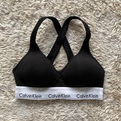 Never Worn! Calvin Klein Cotton Lightly Lined Bralette. Black. Size Small. Perfect Condition. Cheap Black Calvin Klein Bottoms, Sports Bras Calvin Klein, Calvin Klein Black Elastane Bottoms, Calvin Klein Black Stretch Bra, Calvin Klein Fitted Sports Bra, Calvin Klein Bras, Unlined Bra Calvin Klein, Calvin Klein Bra Black, Calvin Klein Sports Bra