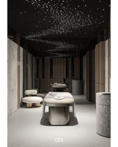 a table and stools in a room with stars on the ceiling above it that reads no