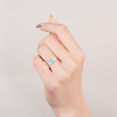 A Touch of Brilliance: The Tya Ring. This handcrafted sterling silver ring features a mesmerizing natural blue fire opal, its color captivating with every twist of your hand. A timeless piece that adds instant elegance to any look (sizes 3.5-14.25). ✦ DETAILS ✦ ✧ Handcrafted ✧ Natural opal and natural crystals ✧ Sizes 3.5-14.25 ✧ This ring set will arrive ready to gift in a Kherish velvet box. ✧ Due to the nature of the crystals, each piece may vary in color, size, shape, and contain natural inc Fire Opals Jewelry, Blue Fire Opal, Fire Opal Ring, Ring Sale, Blue Fire, Salt And Pepper Diamond, Opal Ring, Rutilated Quartz, Pink Opal