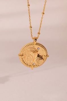 "Beautifully designed charm necklace featuring a Zodiac pendant on delicate gold plated chain.  Choose your Zodiac for a unique personalised gift, engraved on the back with your personalised date of birth or name. The engraving is performed by hand for an authentic and personal touch. Metal: 18k Gold Plated brass Chain length: 45cm with a 2\" extension chain. Complimentary gift wrap for all orders placed in November and December -  with designer stationary brand Sister Paper Co Zodiac gift wrap. Gold Charm Necklace With Zodiac Sign For Gift, Gold Zodiac Sign Charm Necklace As Gift, Gold-plated Zodiac Sign Necklace, Gold Zodiac Sign Charm Necklace For Gift, Gold Zodiac Sign Pendant Charm Necklace, Gold Plated Zodiac Sign Necklaces For Gifts, Designer Stationary, Stationary Brand, Profile Unique