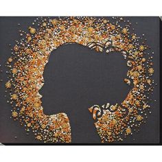 the silhouette of a woman's head is made up of tiny orange and white flowers