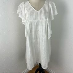 World Market White Cotton Flutter Sleeve Dress S/M Nwt V-Neck Flutter Sleeves Lined Light Gauzy Material Approximate Flat Measurements Pit To Pit 20” Length 35” J13 White V-neck Dress For Spring, White Flowy V-neck Dress For Brunch, Casual V-neck Dress With Ruffle Hem For Vacation, White Butterfly Sleeve Dress For Vacation, White Flutter Sleeve Mini Dress For Vacation, Casual White V-neck Dress For Daywear, White Beach Dress With Butterfly Sleeves, Casual V-neck Dress With Ruffle Sleeves For Summer, Flowy White V-neck Dress For Brunch