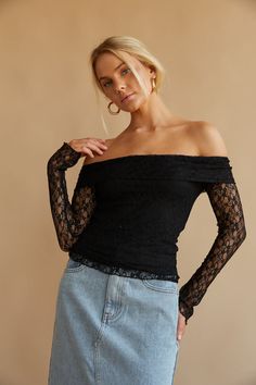 Feel flirty and feminine in the Collette Off The Shoulder Lace Long Sleeve Top! This beautiful top features a fold-over neckline, off-the-shoulder sleeves, and a stunning lace overlay. Available in black, white, and snow. Pair with the Hayden Denim Midi Skirt to complete the look! Details 90% Nylon, 10% Spandex Lining: 94% Polyester, 6% Spandex Lined bodice Hand wash cold / Line dry Off The Shoulder Top Outfit, Shoulder Tops Outfit, Red Floral Top, Lace Long Sleeve Top, Rush Dresses, Red Bodycon, Lace Top Long Sleeve, Lace Long Sleeve, Denim Midi Skirt