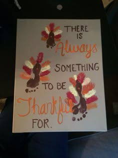 a sign that says there is always something to be grateful for with turkeys painted on it