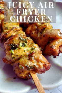 chicken and broccoli kabobs on a white plate with the title juicy air fryer chicken