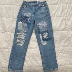 American Eagle Patched Mom Straight Jean. Size 4 Regular. Blue. Excellent Condition, Never Worn. See Pictures. Size And Materials Tag Included. Length Approx. 37 Inches. Waist Approx. 28 Inches. See Pictures. Thank You For Shopping My Closet Item #08 Patches Under Ripped Jeans, American Eagle 90s Boyfriend Jeans, American Eagle 90s Bootcut Jeans, American Eagle Jeans Long, American Eagle Patched Jeans, Hollister Patchwork Jeans, Western Clothes, Jeans American Eagle, Patched Jeans