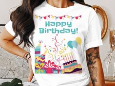 a woman wearing a happy birthday t - shirt with balloons and confetti on it