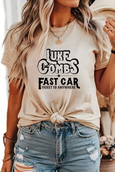 "Step into the wild world of Luke Combs's \"Fast Car\" and embrace the essence of his untamed music with our EliteZCo crewneck collection! Each crewneck is meticulously crafted with premium materials, ensuring superior comfort and durability while embodying the wild spirit of Luke Combs's musical journey. As a devoted fan of Luke Combs's authentic country sound, our crewnecks are an essential addition to your wardrobe. They're more than just apparel; they're a wearable tribute to the raw energy and unforgettable melodies that define Luke Combs's music. Designed for both comfort and style, our crewnecks are perfect for any occasion. Whether you're attending a concert or simply hanging out with friends, these crewnecks offer unbeatable comfort and effortless style that'll have you looking an Luke Combs Shirt Concert, Luke Combs Shirt, Concert Hoodie, Country Concert Shirts, Luke Combs, Fast Car, Western Rodeo, Wild Spirit, Country Concert