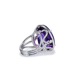 Crafted in 18kt white gold, this ring features a 22.70ct Amethyst center gemstone. The Amethyst is showcased in a beautifully ornate setting that features .75ct of H-VS graded pave set diamonds. SKU: 07287 Store Hours, Diamond Cocktail Rings, Selling Jewelry, Cocktail Rings, Heart Ring, Amethyst, White Gold, Engagement Rings, Gemstones