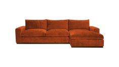 an orange sectional sofa with pillows on the top and bottom, in front of a white background