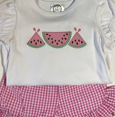 Custom embroidered Watermelon shirt for girls.    A name may also be added!! Choose your font choice and thread color if a name is to be added for your little girls watermelon shirt. List these in the personalization section. I apply tender touch to back of embroidery design as to not scratch your little one.  Matching shorts can be found in separate listing.  Wash in cold water inside out and line dry. Warm iron if needed.  I look forward to making something special for little one.  If you have any questions please feel free to message me. Pink Short Sleeve T-shirt With Machine Embroidery, Cute T-shirt With Machine Embroidery And Short Sleeves, Cute Embroidered Summer Tops, Fitted Summer T-shirt With Strawberry Print, Cute Pink T-shirt With Machine Embroidery, Fitted Strawberry Print T-shirt For Summer, Fitted Summer Tops With Embroidered Graphics, Playful Embroidered Short Sleeve Tops, Summer Embroidered Cotton Shirt