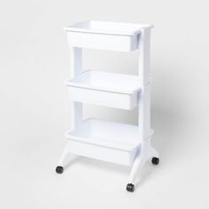 a white shelf sitting on top of a table