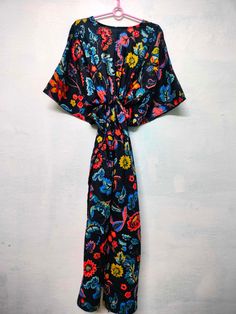 We also take wholesale orders in best wholesale price. For order contact us. "♥ Welcome to Handicraft Tex ♥" Description Item details:-Handmade Material:-Cotton Size One size (plus) US women's letter Product: 1 PC Printed Cotton Kaftan Cotton Kaftan / Kimono made From Hand block Printed Fabric.It is hand printed fabric using natural dyes Measurements or Sizes: (APPROX) Length- 48 Inches Bust-48 inches Size: Free Size Kimono Color: Multi-color as Shown in Image. Note: The color and brightness of Multicolor Printed Wrap Cover-up, Multicolor V-neck Kimono For Vacation, Multicolor V-neck Kimono For Beachwear, Beach Cover-up Kaftan With Tie Waist, Beachwear Kaftan With Tie Waist For Beach Cover-up, Short Sleeve Black Kimono For Beach, Black Short Sleeve Kimono For Beach, Black Short Sleeve Beach Kimono, Multicolor One Size Beachwear Kimono