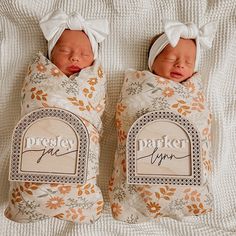 two newborn babies wrapped in blankets on top of a white blanket with the words parker and morgan