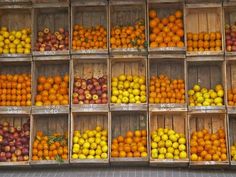 crates filled with lots of different types of fruit