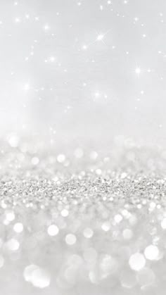 a white background with sparkling lights and stars