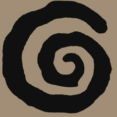 an image of a spiral design in black and tan colors on a brown background,