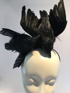 "Black Bird fascinator -Crow- The Birds- Halloween- Feather Headband -Derby- Ravens- goth- Steampunk- Mad Hatter Hello, I have one made so it can ship within a day or two. This fascinator is perfect to add whimsy and is just so fun you'll be the life of the party. A great conversation piece Wear this with a 1960's tweed suit and your \"the Birds\"! This black feather fascinator has 2 black feather bird... I call them Alfred and Tippy. It has great movement. It not a real bird, its styrofoam cove Adjustable Punk Headpieces For Costumes, Adjustable Black Mini Hats For Cosplay, Black Adjustable Punk Mini Hat, Adjustable Black Punk Mini Hat, Punk Style Headpieces For Halloween, Adjustable Black Fantasy Costume Hats And Headpieces, Gothic Black Mini Hats For Halloween, Black Gothic Mini Hats For Costume Party, Adjustable Punk Mini Hats For Halloween