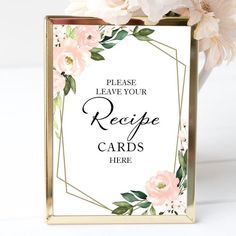 there is a card holder with flowers in it and the words please leave your recipe cards here