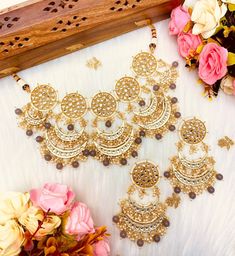 This Modern Choker set with oversized chandbali but not extra big as they are light adn simple is gorgeous for pre wedding festivities or any event. The Kundan choker set is timeless and so versatile and comes with matching jhumka and is in gold and two beautiful colors work high quality work. it is beautifully handmade and is perfect for any party or event! Gold plating and Gray and pastel beige/peach colored beads make it a beautiful piece that will look great with any color outfit! This light Chandbali Bridal Necklace For Celebrations, Chandbali Bridal Necklace For Diwali, Festive Chandbali Bridal Sets For Eid, Diwali Bridal Chandbali Necklace, Chandbali Bridal Necklace For Party, Eid Celebration Chandbali Jewelry Sets, Chandbali Bridal Necklace With Stone Work For Eid, Kundan Chandbali Bridal Sets For Eid, Kundan Bridal Sets In Chandbali Shape For Eid