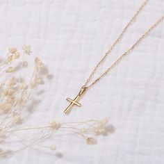 This 9k Gold Cross Necklace includes a beautifully delicate fine gold chain and a cross pendant crafted out of 9k solid gold. Pair with a personalized engraved necklace or simply wear it alone for a statement look.9K Fine GoldCross charm size: Length 12mm, Width 8 mm, Thickness: 0.8 mmSecure clasp fasteningCharms are removable from this chainHand engraved in our Paris workshopSent with love in a complimentary gift boxAny slight variations in lettering depth, spacing and alignment from the exampl 14k Yellow Gold Filled Cross Necklace, Dainty 14k Gold Cross Charm Necklace, Dainty 14k Gold Cross Pendant Charm Necklace, Dainty 14k Yellow Gold Cross Necklace, Gold Cross Charm Necklace In 14k, Yellow Gold Cross Charm Necklace With Delicate Chain, Yellow Gold Cross Pendant Charm Necklace With Delicate Chain, Yellow Gold Cross Charm Necklace Tarnish Resistant, 14k Yellow Gold Necklace For First Communion