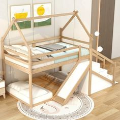 there is a bunk bed with stairs and slides on the floor in front of it