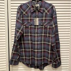 It’s A Nwt Button Down Shirt In A Blue, White, And Dark Red Plaid. Very Soft Cotton With A Flannel-Like Feel. Has Two Front Pockets, Snap Buttons, And Western Details Like The Yoke Shoulder Stitching. Made In Portugal. 20” Wide And 32” Long. Checks / Gingham Fitted Flannel Shirt For Workwear, Fitted Button-up Flannel Shirt For Work, Fitted Plaid Flannel Shirt With Spread Collar, Fitted Flannel Button-up Shirt, Casual Fitted Flannel Shirt With Spread Collar, Fitted Casual Flannel Shirt With Spread Collar, Blue Buttoned Flannel Shirt For Work, Blue Flannel Shirt With Buttons For Work, Blue Button-up Flannel Shirt For Work