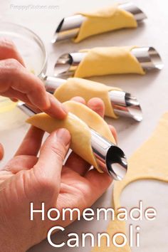 someone is making homemade cannoli with cheese